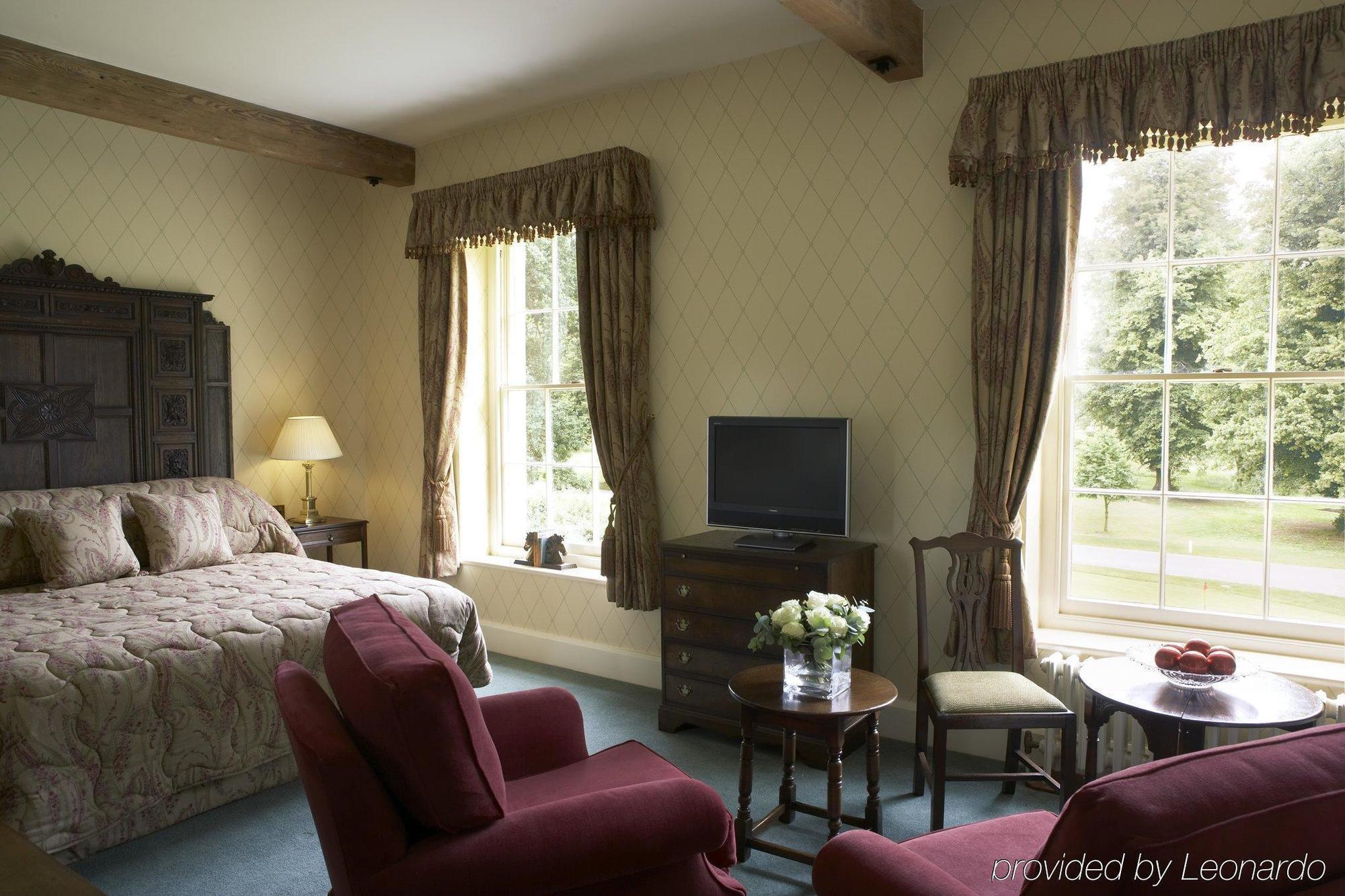 فندق لوتون هوو، وغولف أند سبا الغرفة الصورة A room at the hotel