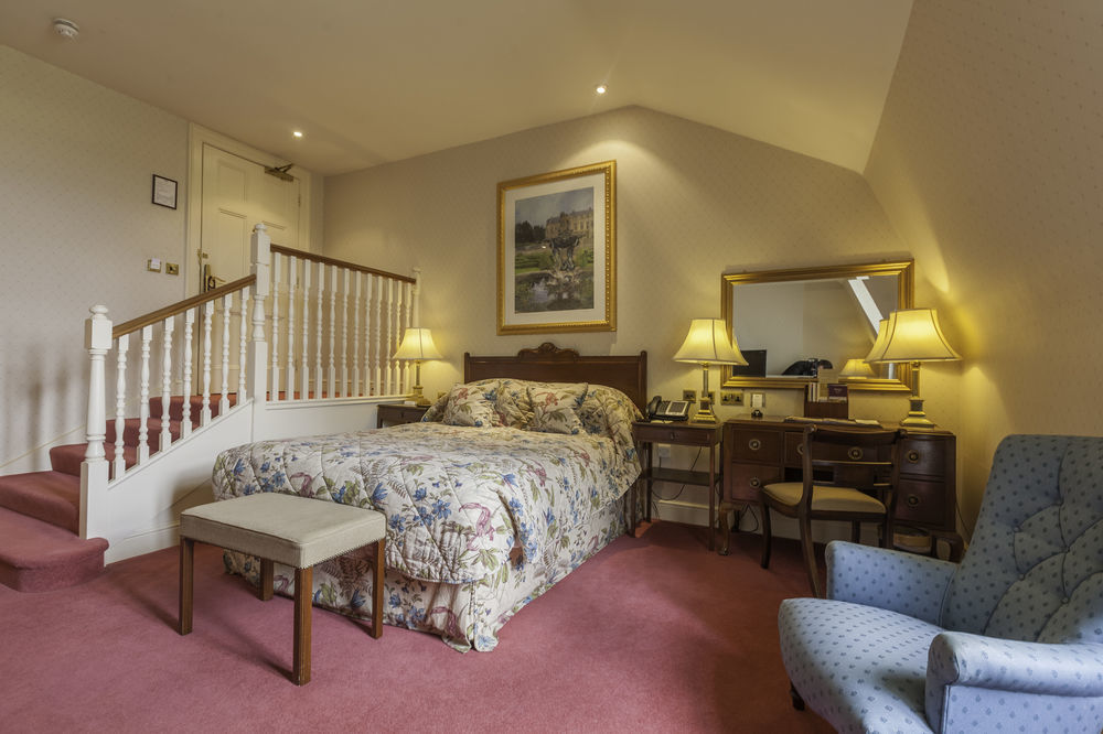 فندق لوتون هوو، وغولف أند سبا المظهر الخارجي الصورة A bedroom at the hotel